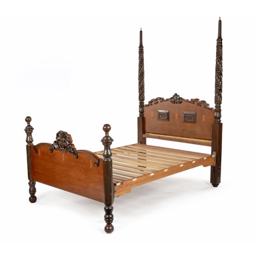 103 - A TEAK AND MAHOGANY BED