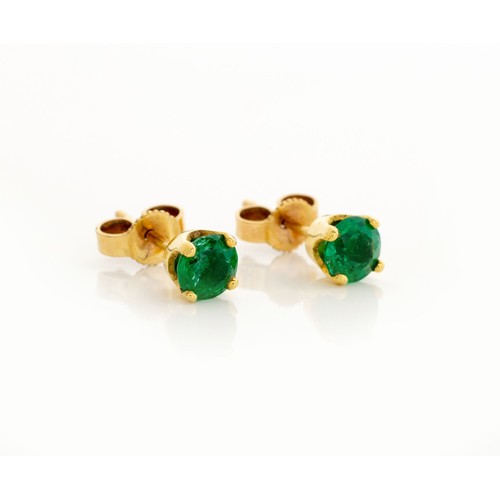 604 - A PAIR OF EMERALD EAR STUDS