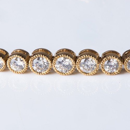 681 - A DIAMOND TENNIS BRACELET