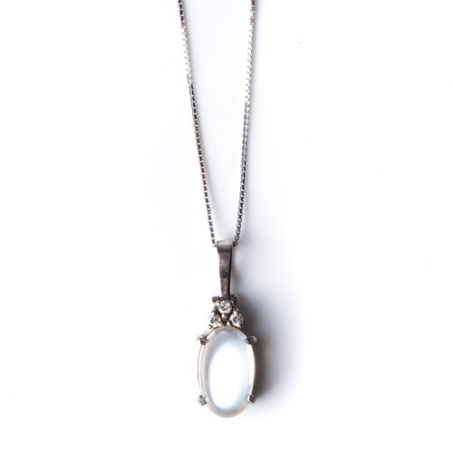 700 - A MOONSTONE AND DIAMOND PENDANT