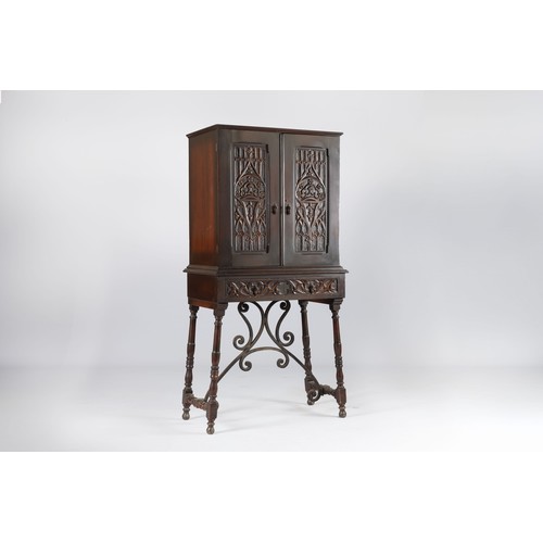 101 - AN EBONISED CABINET-ON-STAND, 20TH CENTURY