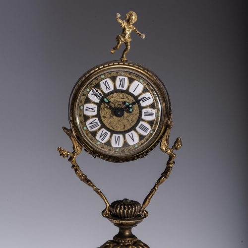 570 - A FRENCH GILT METAL AND PORCELAIN CLOCK