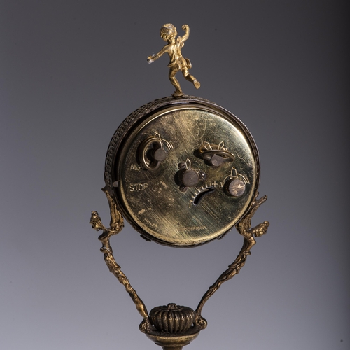 570 - A FRENCH GILT METAL AND PORCELAIN CLOCK