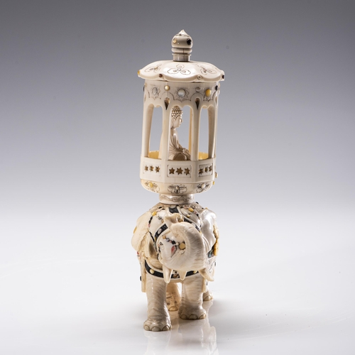 669 - A JAPANESE IVORY SHIBAYAMA BUDDHA AND ELEPHANT GROUP, MEIJI PERIOD, 1868 – 1912