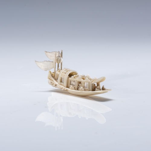 673 - A JAPANESE IVORY MODEL OF A BOAT, TAISHO PERIOD, 1912 – 1926