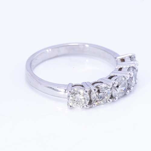 896 - A DIAMOND HALF-ETERNITY RING