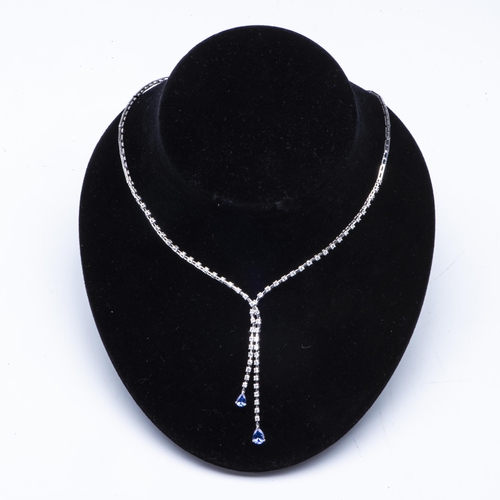 941 - A DIAMOND AND TANZANITE NECKLACE