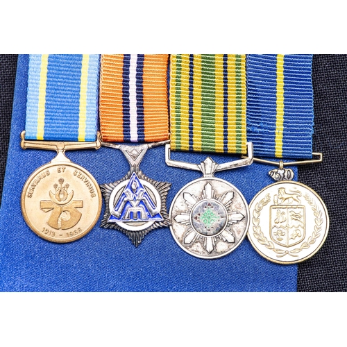 370 - A SAPS COLONEL'S MESS DRESS UNIFORM WITH DRESS MEDALS AND ACCOMPANING PHOTOGRAPH