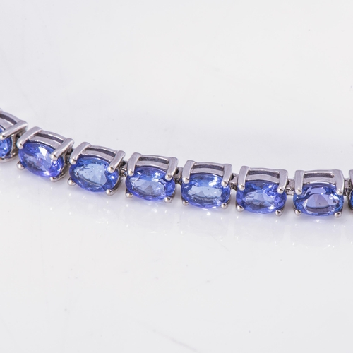 922 - A TANZANITE TENNIS BRACELET