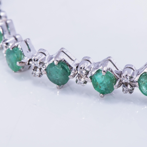 925 - A DIAMOND AND EMERALD BRACELET