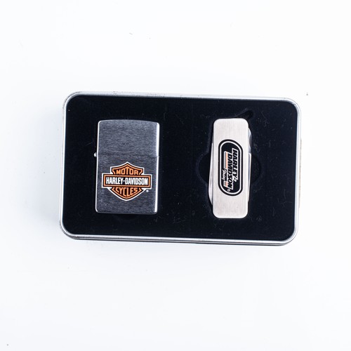 110 - FOUR CASED HARLEY DAVIDSON ZIPPO LIGHTERS AND KEYRINGS