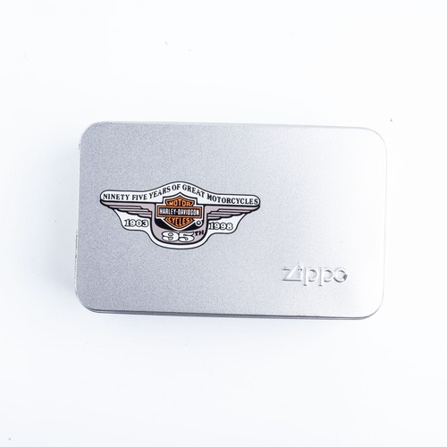 125 - A CASED HARLEY DAVIDSON ZIPPO LIGHTER AND KEYRING