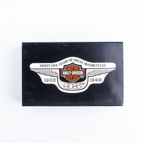 125 - A CASED HARLEY DAVIDSON ZIPPO LIGHTER AND KEYRING