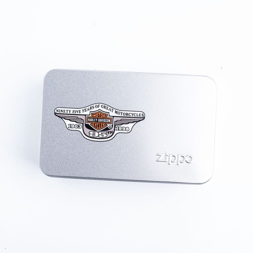 127 - A CASED HARLEY DAVIDSON ZIPPO LIGHTER AND KEYRING