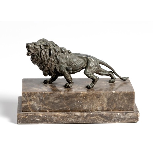 553 - A GERMAN BRONZE FIGURE OF A LION