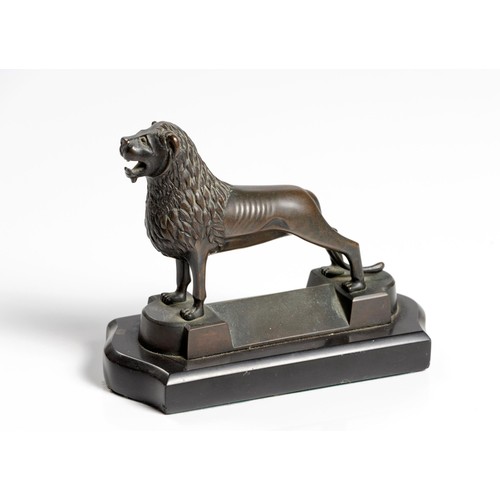 555 - A GREEK-STYLE BRONZE LION