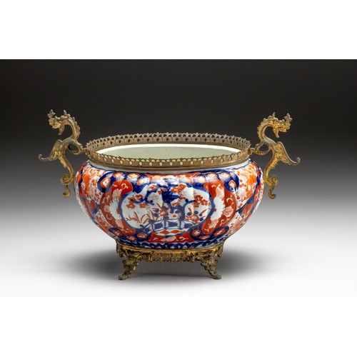 668 - A JAPANESE IMARI GILT-METAL MOUNTED RIBBED BOWL, MEIJI PERIOD, 1868 - 1912