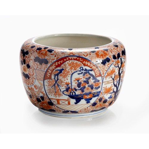 675 - A JAPANESE IMARI 'FLOWER BASKET' BOWL, MEIJI PERIOD, 1868 - 1912