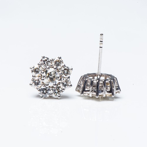 911 - A PAIR OF DIAMOND CLUSTER EARRINGS