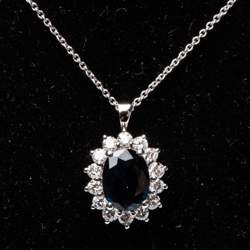 871 - A DIAMOND AND SAPPHIRE PENDANT