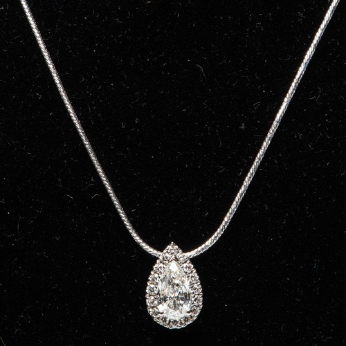 895 - A DIAMOND HALO PENDANT