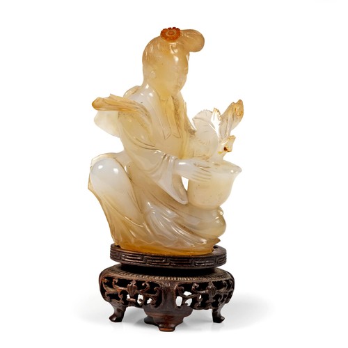 627 - A CHINESE AGATE FIGURE OF A MAIDEN, QING DYNASTY, 19TH CENTURY