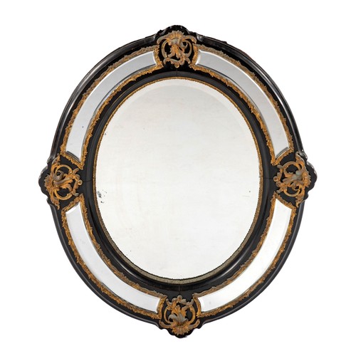 436 - AN EBONISED AND GILT-METAL MOUNTED MIRROR