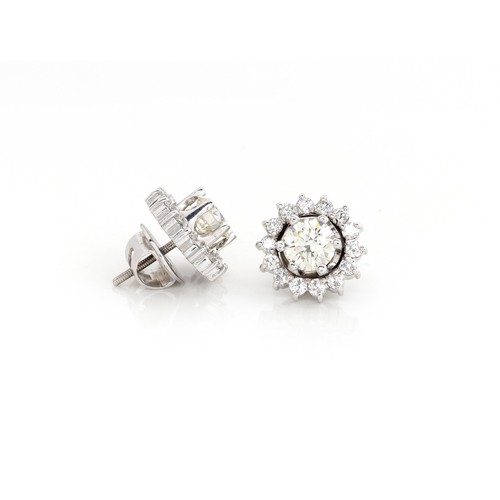 843 - A PAIR OF DIAMOND EARRINGS