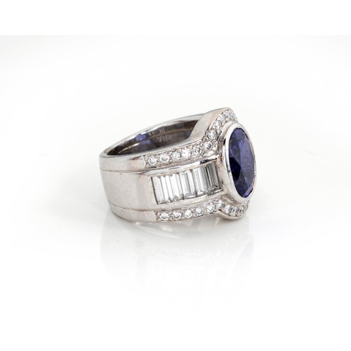 872 - A TANZANITE AND DIAMOND RING