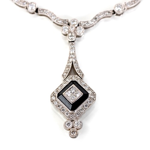 915 - A DIAMOND NECKLACE, BROWNS