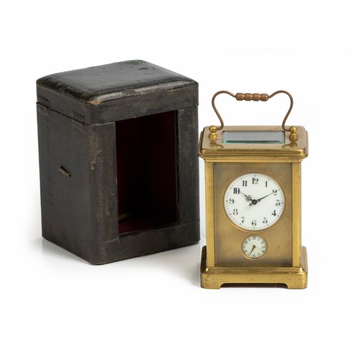 163 - A CASED BRASS CARRIAGE CLOCK