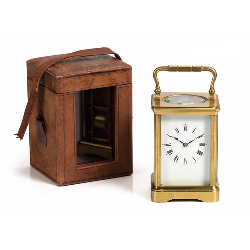 167 - A CASED BRASS CARRIAGE CLOCK