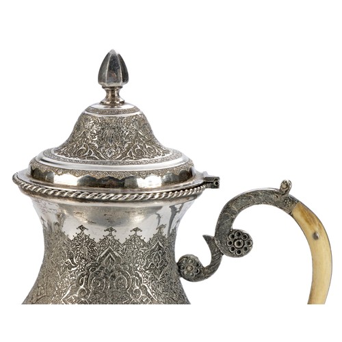 768 - A FOUR PIECE PERSIAN SILVER TEA SET