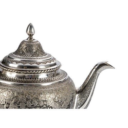 768 - A FOUR PIECE PERSIAN SILVER TEA SET