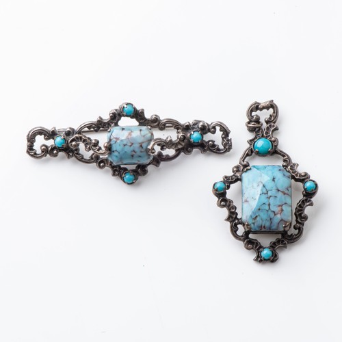 835 - A SILVER AND TURQUOISE SETThe pendant 4cm, the brooch 5cm, circa 1960s (2)... 