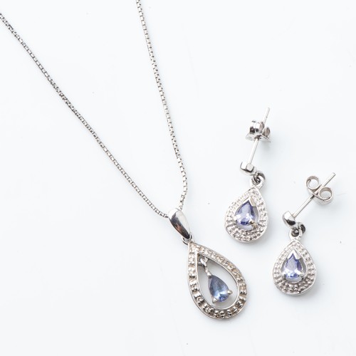 836 - A SUITE OF TANZANITE JEWELLERYComprising: a pendant and pair of earrings set in 9ct white gold(2)... 