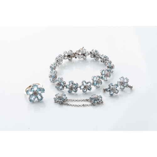 838 - A SUITE OF AQUAMARINE JEWELLERYComprising: a ring, bracelet and a pair of earrings  in 18ct white go... 