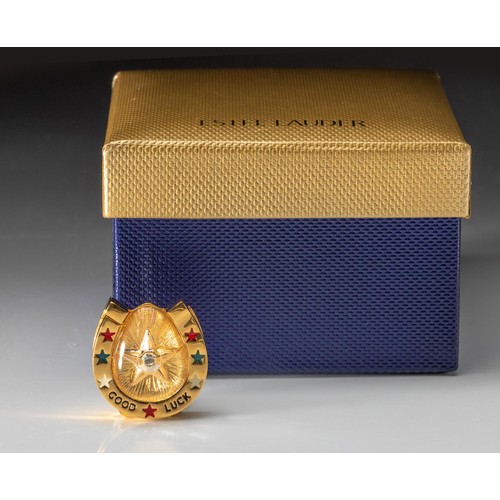 156 - AN ESTEE LAUDER SOLID PERFUME COMPACT, GOOD LUCK HORSE SHOE, 2004