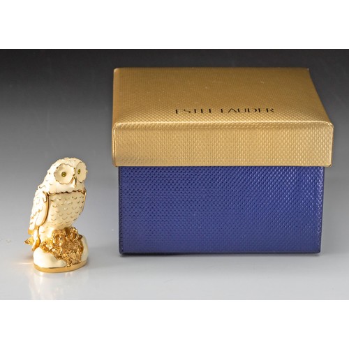 64 - AN ESTEE LAUDER SOLID PERFUME COMPACT, GLISTENING OWL, 2005