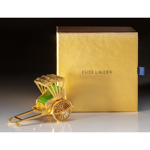 134 - AN ESTEE LAUDER SOLID PERFUME COMPACT, GOLDEN RICKSHAW, 2009