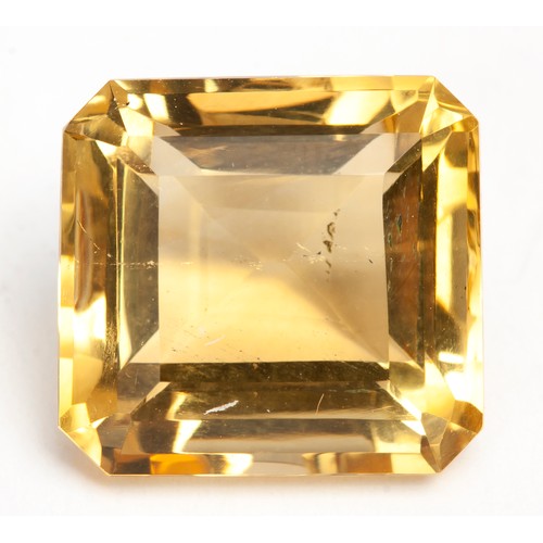 422 - AN EMERALD CUT CITRINE 10.7 CARATS