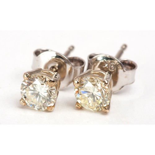 83 - A PAIR OF DIAMOND STUD EARRINGS