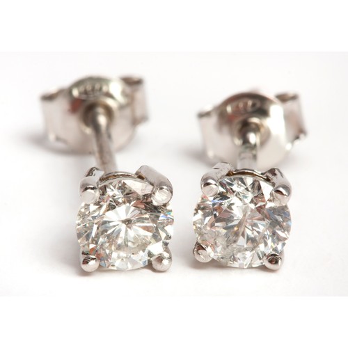 84 - A PAIR OF DIAMOND STUD EARRINGS