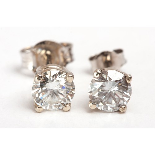 86 - A PAIR OF DIAMOND STUD EARRINGS