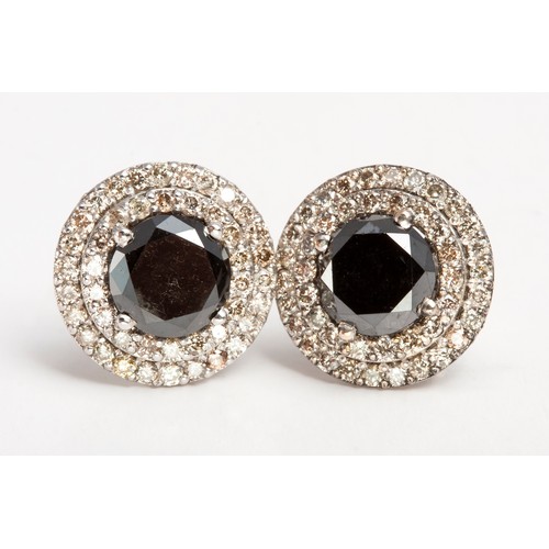 107 - A PAIR OF DIAMOND EARRINGS