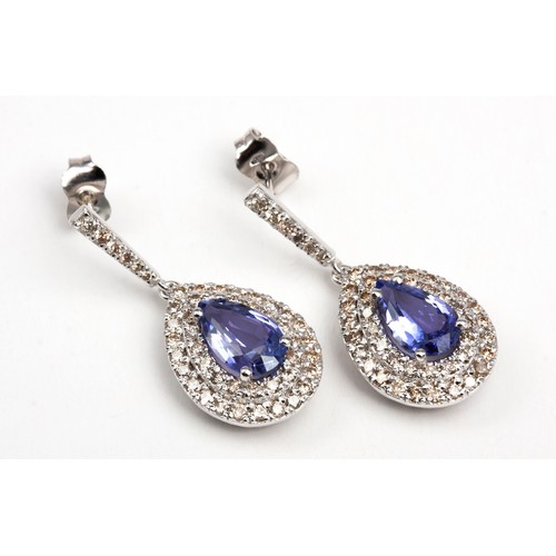 111 - A PAIR OF DIAMOND AND TANZANITE DESIGNER EARRINGS