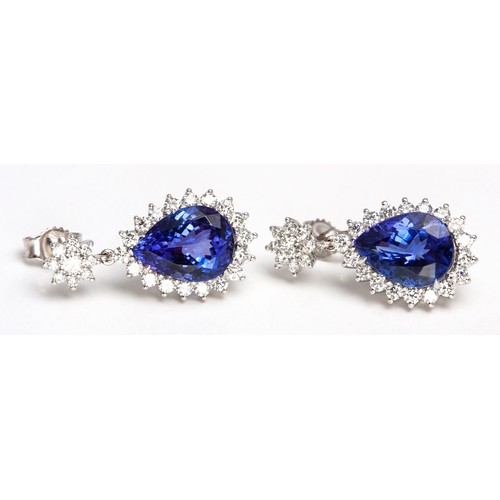 112 - A PAIR OF DIAMOND AND TANZANITE EARRINGS, BROWNS