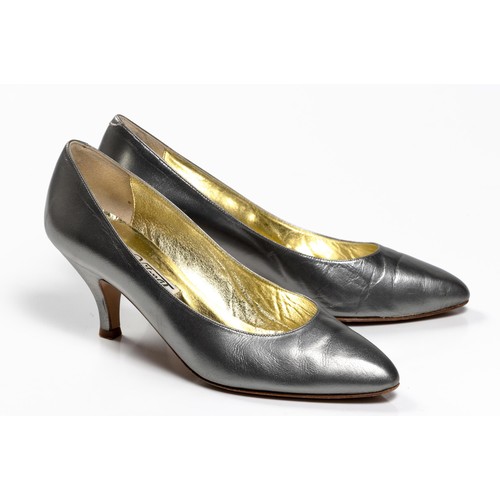 328 - A PAIR OF SILVER LEATHER HEELS