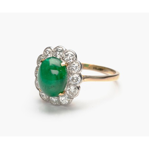 1003 - AN EMERALD AND DIAMOND RING