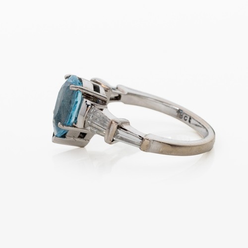 1033 - A BLUE TOPAZ AND DIAMOND RING